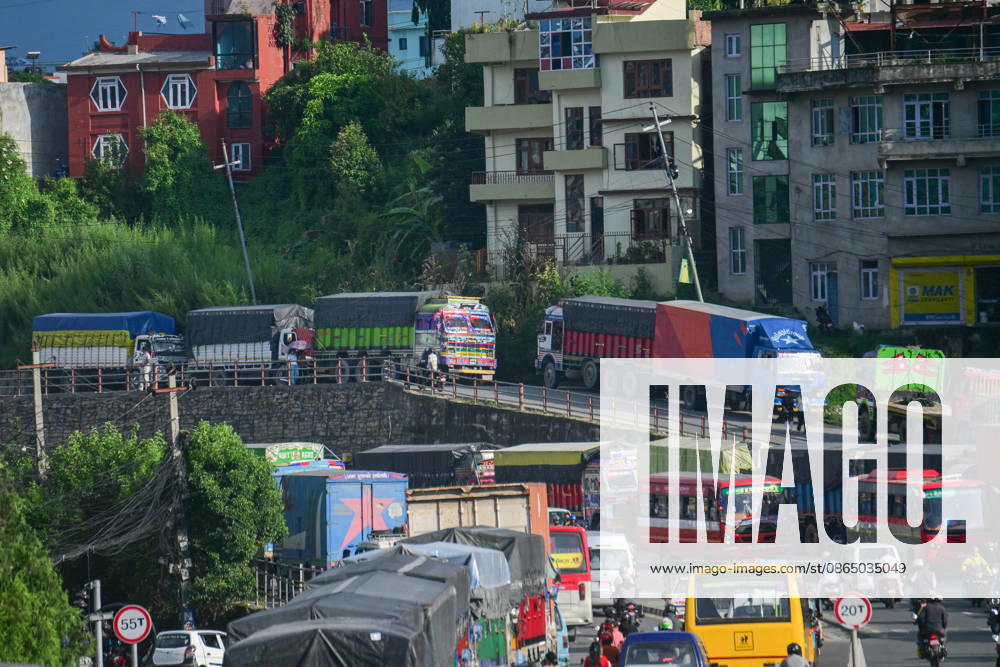 Trucks and other vehicles remain stranded along the KalankiÃ¢â‚¬ThankotÃ¢â‚¬Nagdhunga route in Kathmandu, Nepal, on August 27, 2026, as major highways remain closed following devastating flash floods and landslides. The stranded vehicles have occupied multiple lanes along the road, causing traffic congestion and further disrupting movement in the area. The floods swept through Rasuwa and other parts of central Nepal before surging downstream along the Trishuli and Narayani river systems, damaging roads, bridges, settlements and other infrastructure. The NagdhungaÃ¢â‚¬Muglin route, a key road connection between Kathmandu and other parts of the country, has been closed, disrupting the movem - ZUMAs330 20260827_zsp_s330_011