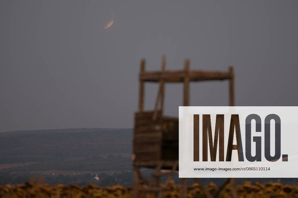 Partial lunar eclipse observed from Northern Hungary ZSUJTA, HUNGARY - AUGUST 28: A partial lunar eclipse, caused by the Moon passing through Earth s shadow, is observed above a tiny village of Zsujta, Hungary, on August 28, 2026. Robert Nemeti Anadolu Zsujta Hungary. Editorial use only. Please get in touch for any other usage.