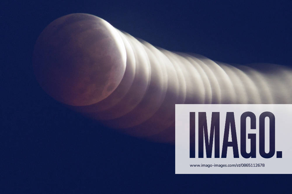 Partial Lunar Eclipse Seen Over Southern France. France - Sete, 28.08.2026 A long time exposure with intentional movement as the Moon appears reddish during a partial lunar eclipse this Friday morning over Sete in southern France. Occitania