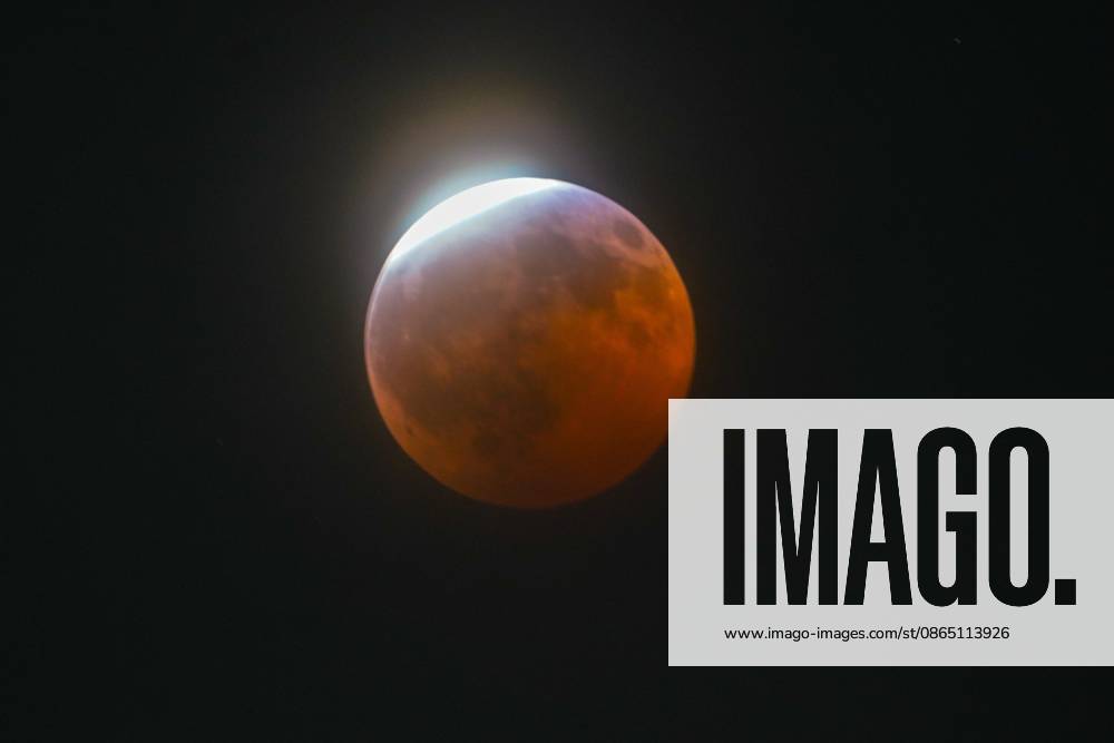The eclipse is seen over the sky of San Diego..A partial lunar eclipse is seen over San Diego as EarthÃ¢â‚¬â ¢s shadow passes across the full moon, turning much of the moonÃ¢â‚¬â ¢s surface a reddish-orange color. The eclipse reached its maximum at approximately 9:12 p.m., when about 93% of the moon was covered by EarthÃ¢â‚¬â ¢s shadow. San Diego United States - ZUMAs197 20260827_aaa_s197_060