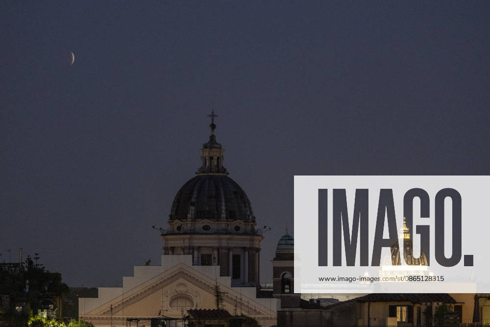 Partial Lunar Eclipse over Rome ROME, ITALY - AUGUST 28: The moon is seen over Sant Ambrogio e Carlo al Corso dome and St. Peter s dome during the partial lunar eclipse in Rome, Italy, on August 28, 2026. Riccardo De Luca Anadolu Rome Italy. Editorial use only. Please get in touch for any other usage.