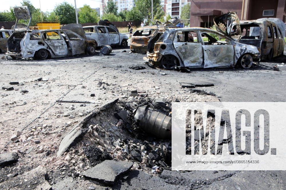 A fragment of a Russian drone lies in the crater by burnt-out cars in a parking lot near a residential complex, Vyshneve, Bucha district, Kyiv region, Ukraine, August 28, 2026. A drone struck the courtyard of a residential complex, sparking a large-scale fire that destroyed more than a dozen civilian vehicles. The powerful shock wave shattered windows and damaged the facades of nearby high-rise buildings. One man was killed in the Bucha district in this morning’s attack, and another civilian sustained multiple shrapnel wounds. (Photo by Volodymyr Tarasov Ukrinform) Aftermath of Russian drone attack in Vyshneve in Kyiv region