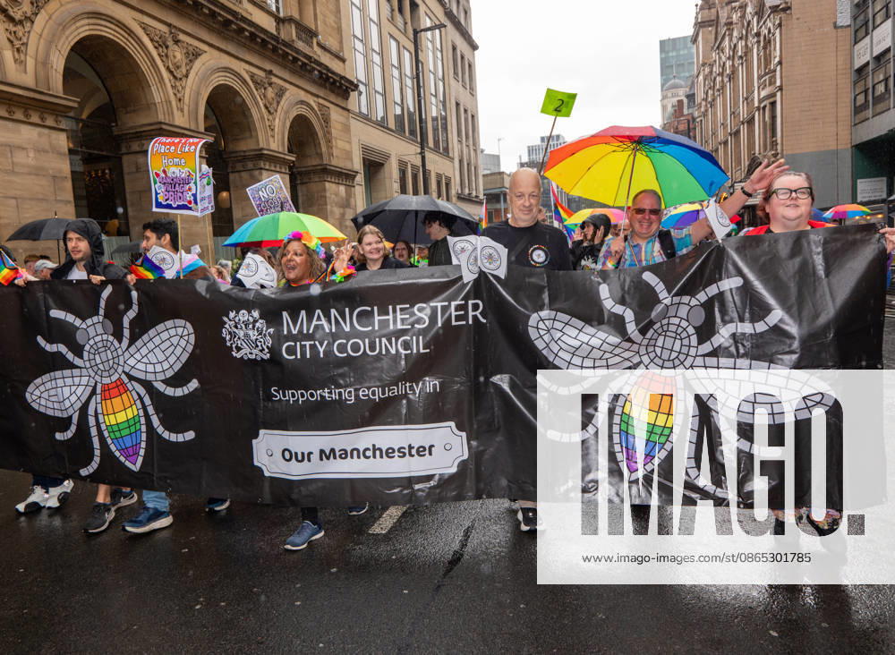 Manchester Bee on Manchester Council banner seen during the pride parade. Revelers refused to let a heavy downpour dampen their spirits as the annual parade makes its way through the city centre. Despite the torrential rain, the LGBTQ+ community and supporters partied anyway, filling the streets with vibrant colour, music, and joy. The festival has been officially renamed Manchester Village Pride this year, marking a new community-led chapter after the voluntary liquidation and financial collapse of the former organizing company last autumn. Taking part in the celebrations, the newly elected Mayor of Greater Manchester, Bev Craig, actively engaged with parade participants and cheering crowds alon - ZUMAs197 20260829_aaa_s197_353