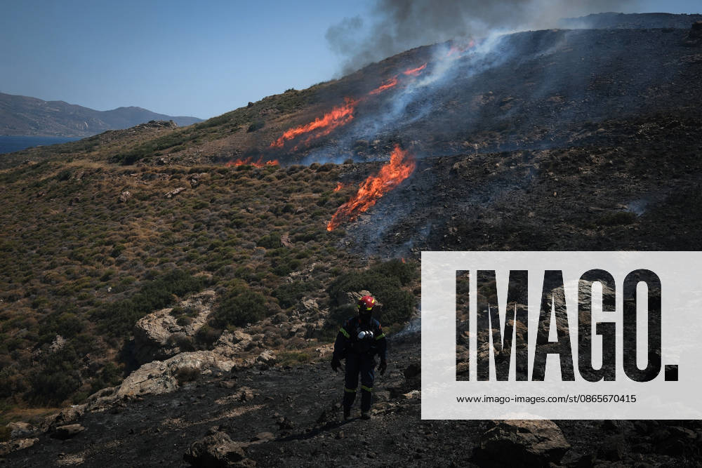 Wildfire burns near Karystos on Greece s Evia island KARYSTOS, GREECE - SEPTEMBER 2: A firefighter stands near flames as a wildfire burns on a hillside near Karystos on the island of Evia, Greece, on September 2, 2026. Costas Baltas Anadolu Karystos Greece. Editorial use only. Please get in touch for any other usage.