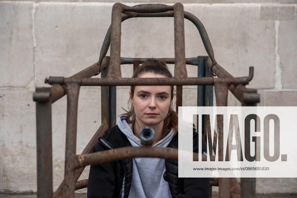 End Factory Farming in London, UK - 02 Sep 2026 Animal rights activist, Michelle Farnham looks into the camera as she spends her second day in the cage outside the National Gallery at the Trafalgar Square in London. Animal Rising organisation staged a campaign for three weeks with a supporter Michelle Farnham who will live, eat and sleep in a pig farrowing crate at the Trafalgar Square in London, UK. Animal Rising organisation campaigns to end factory farming by 2040 because of the animal cruelties and serious health issues of the animals in these farms. Also the health affect at nearby population around these farms. London United Kingdom