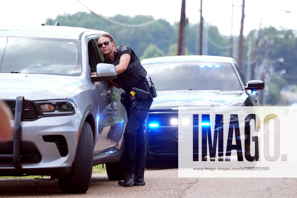 Police maintain traffic as community members protest outside Mason ICE detention facility, CoreCivic, in Mason, Tennessee September 2, 2026. The Department of Homeland Security confirmed ICE agents arrested 121 individuals at a bar Sat. Aug. 29, 2026. Many were released after providing legal documentation. Mason USA - ZUMAf103 20260902_zaf_f103_011