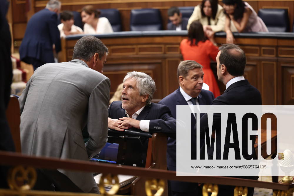 Sánchez Appears Before Congress to Report on the Government’s Response to the Migration Crisis in Ceuta Prime Minister Pedro Sánchez (left) and Interior Minister Fernando Grande Marlaska (right) converse during a plenary session in the Congress of Deputies on September 3, 2026, in Madrid, Spain. Sánchez will appear before the full Congress this Thursday to report on the government’s response to the events that have taken place in Ceuta since July 30 and on the current situation in the autonomous city. SEPTEMBER 3, 2026 Madrid, Spain