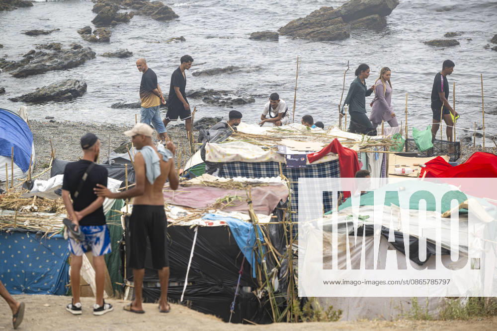 Trampolín Beach Continues to Host Hundreds of Migrants Hundreds of migrants are camped on Trampolín Beach, as of September 3, 2026, in Ceuta, Spain. Trampolín Beach is home to a large number of makeshift shacks despite previous attempts to relocate migrants to other designated areas. The site is also used by the Red Cross for daily food distribution. SEPTEMBER 3, 2026 MIGRATION CRISIS Ceuta Ceuta, Spain