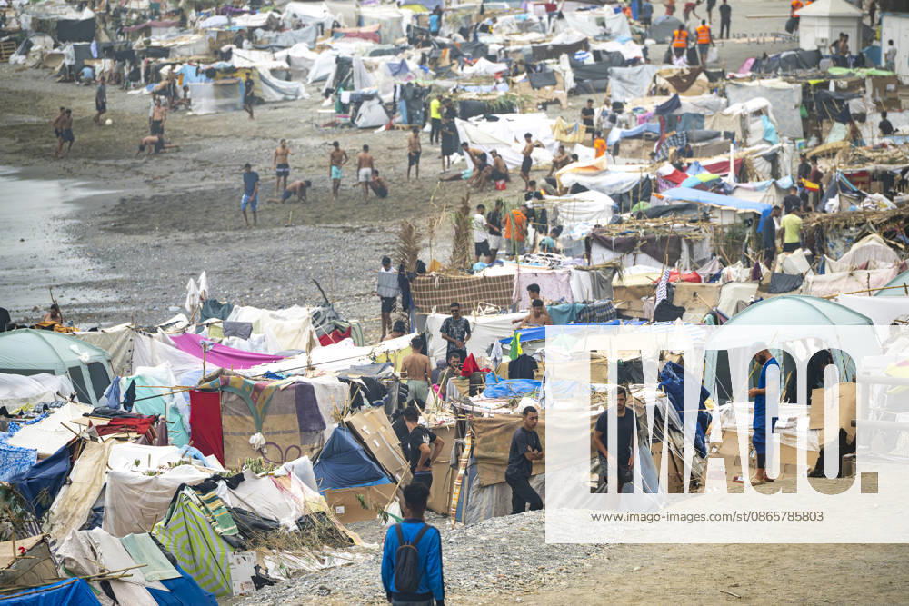 Trampolín Beach Continues to Host Hundreds of Migrants Hundreds of migrants are camped on Trampolín Beach, as of September 3, 2026, in Ceuta, Spain. Trampolín Beach is home to a large number of makeshift shacks despite previous attempts to relocate migrants to other designated areas. The site is also used by the Red Cross for daily food distribution. SEPTEMBER 3, 2026 MIGRATION CRISIS Ceuta Ceuta, Spain