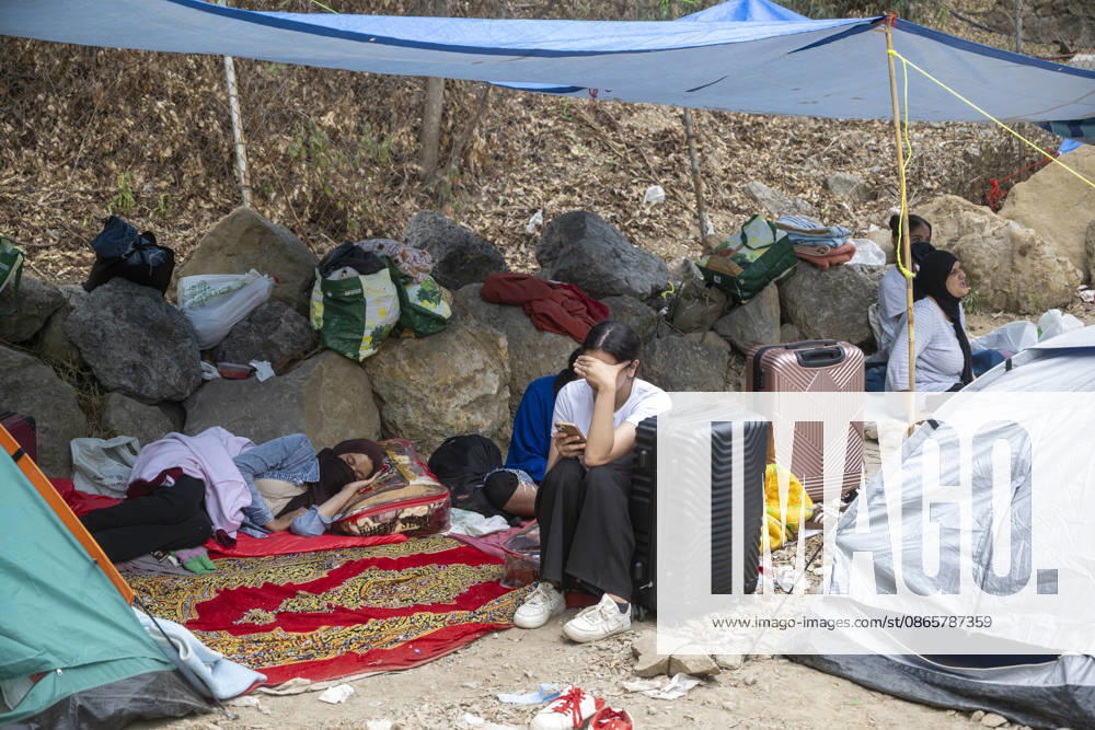 Women and children wait at the gates of La Hípica to be taken in. Several migrant women wait at the gates of the La Hípica Equestrian Center in Ceuta on September 3, 2026, in Ceuta, Spain. Dozens of migrant women with their children are waiting in makeshift camps to be housed at the La Hípica Equestrian Center. On August 31, the center began receiving migrant women and girls who had been living in various temporary settlements throughout the city, as part of the initiative launched to dismantle these camps and transfer their occupants to temporary shelter facilities set up by the authorities. SEPTEMBER 3, 2026 PIXELATED MIGRATION CRISIS Ceuta Ceuta, Spain