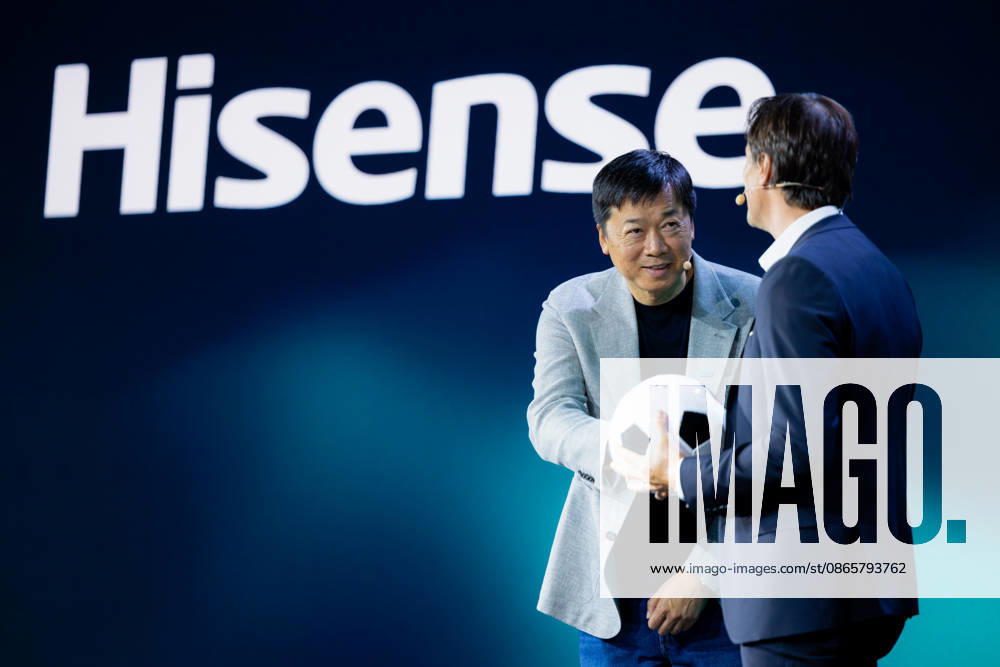 Hisense Press Conference at IFA Germany, Berlin, on September 3, 2026. Hanson Han, CEO of Hisense Europe, and Guillaume Sabran, Chief of Sponsorship and Licensing at UEFA, holding a soccer ball. Hisense is an official sponsor of the 2028 UEFA Euro soccer tournament in the UK and Ireland.