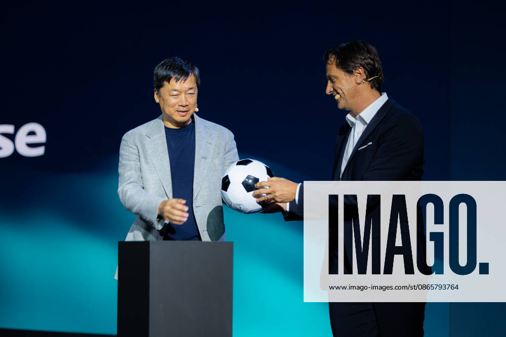 Hisense Press Conference at IFA Germany, Berlin, on September 3, 2026. Hanson Han, CEO of Hisense Europe, and Guillaume Sabran, Chief of Sponsorship and Licensing at UEFA, holding a soccer ball. Hisense is an official sponsor of the 2028 UEFA Euro soccer tournament in the UK and Ireland.