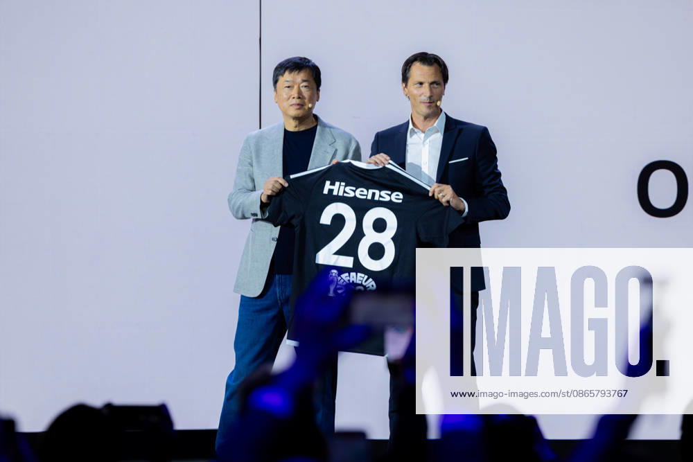 Hisense Press Conference at IFA in Germany, Berlin, September 3, 2026. Hisense Europe CEO Hanson Han and UEFA Chief of Sponsorship and Licensing Guillaume Sabran jointly hold up a jersey with the number 28. Hisense is an official sponsor of the UEFA Euro 2028 soccer tournament in the UK and Ireland.