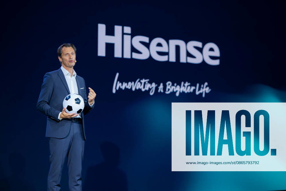 Hisense Press Conference at IFA Germany, Berlin, on September 3, 2026. Guillaume Sabran, Chief of Sponsorship Licensing at UEFA, holding a soccer ball. Hisense is an official sponsor of the 2028 UEFA Euro soccer tournament in the UK and Ireland.