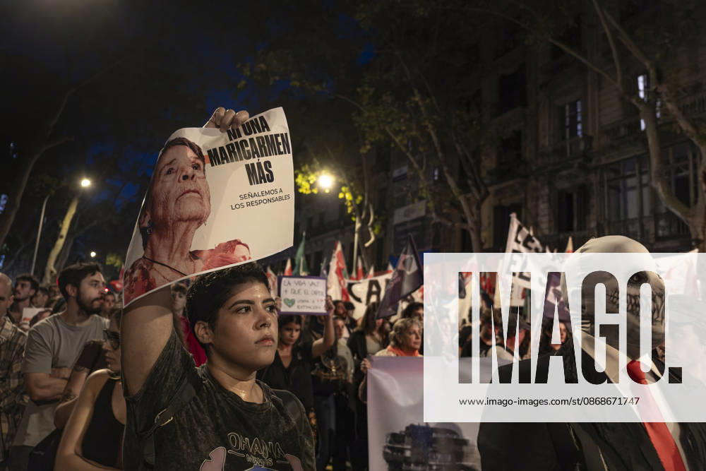 A protester is seen displaying a portrait of Maricarmen, the elderly woman evicted in Madrid. Mobilized by the Barcelona Tenants Union and following the expiration of the Maricarmen decree that regulated the right to housing thousands of people have demonstrated in central Barcelona, ??calling for a general strike. Barcelona Spain - ZUMAs197 20261005_aaa_s197_111