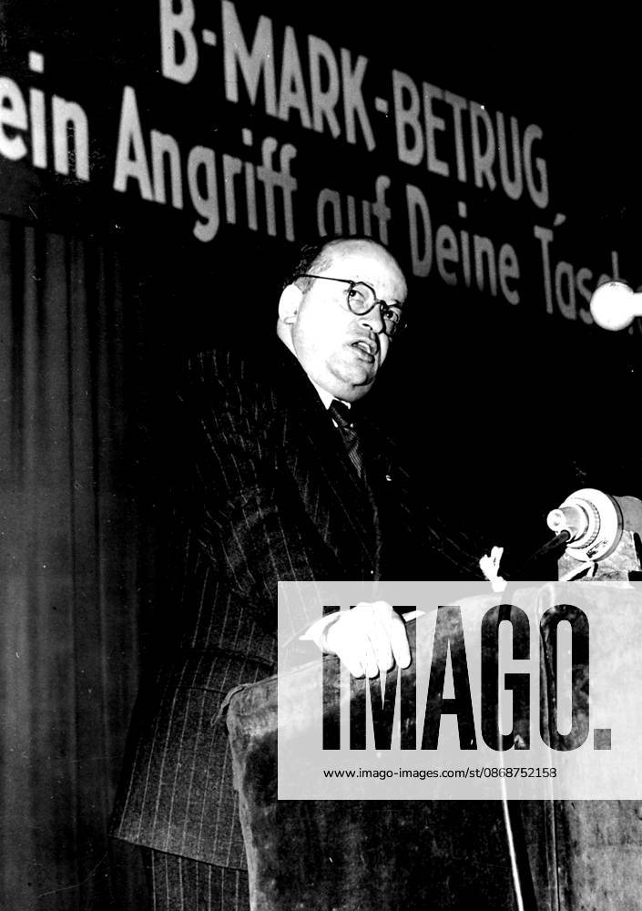 Berlin s Communist Mayor Attacks Britain, Currency Protest Meeting -- Friedrich Ebert, Communist Mayor of Eastern Berlin and son of the first German President, launching his attack against Britain during a meeting objecting to the Continuance of western currency in this city. Ebert, speaking in the Friedrichstadt Place, soviet sector, seized the recent Oliver Twist film demonstrations as a British-inspired move. It was no accident that at the very moment when a currency panic was created, another turmoil was arranged , he asserted. February 26, 1949.
