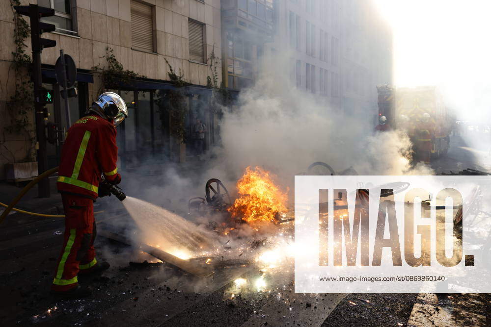 Aftermath of clashes during nationwide protests in Paris PARIS, FRANCE - OCTOBER 18: Firefighters extinguish fires set to bicycles and street debris as streets across Paris show signs of damage following a day of violent clashes between police and protesters amid a nationwide mobilization over rising living costs, fuel prices, and education funding in Paris, France, on October 18, 2026. Ibrahim Ezzat Anadolu Paris France. Editorial use only. Please get in touch for any other usage.
