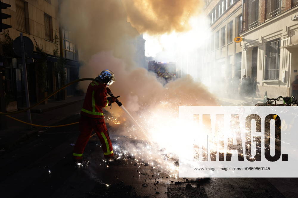 Aftermath of clashes during nationwide protests in Paris PARIS, FRANCE - OCTOBER 18: Firefighters extinguish fires set to bicycles and street debris as streets across Paris show signs of damage following a day of violent clashes between police and protesters amid a nationwide mobilization over rising living costs, fuel prices, and education funding in Paris, France, on October 18, 2026. Ibrahim Ezzat Anadolu Paris France. Editorial use only. Please get in touch for any other usage.