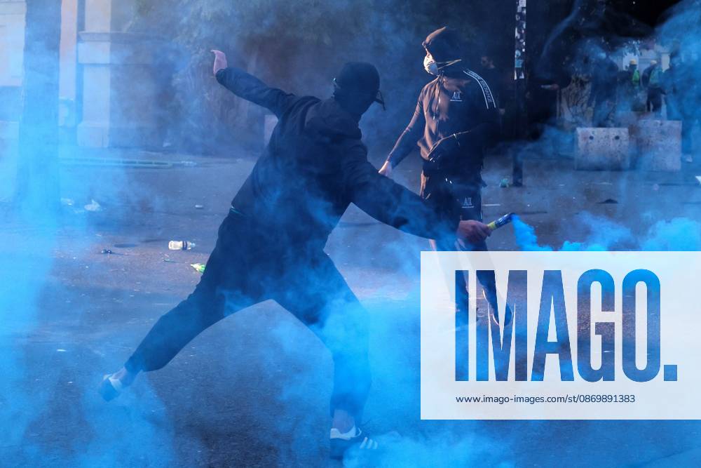 Demonstrators clash with riot police in Skanderbeg Square as student-led anti-government protests continue for a sixth consecutive day. Confrontations spread from the Ministry of Education to central Tirana, with protesters throwing stones and pyrotechnics while police deploy tear gas and water cannons. Demonstrators demand improved university conditions and the resignation of Prime Minister Edi Rama. Tirana Albania - ZUMAq101 20261018_zna_q101_215