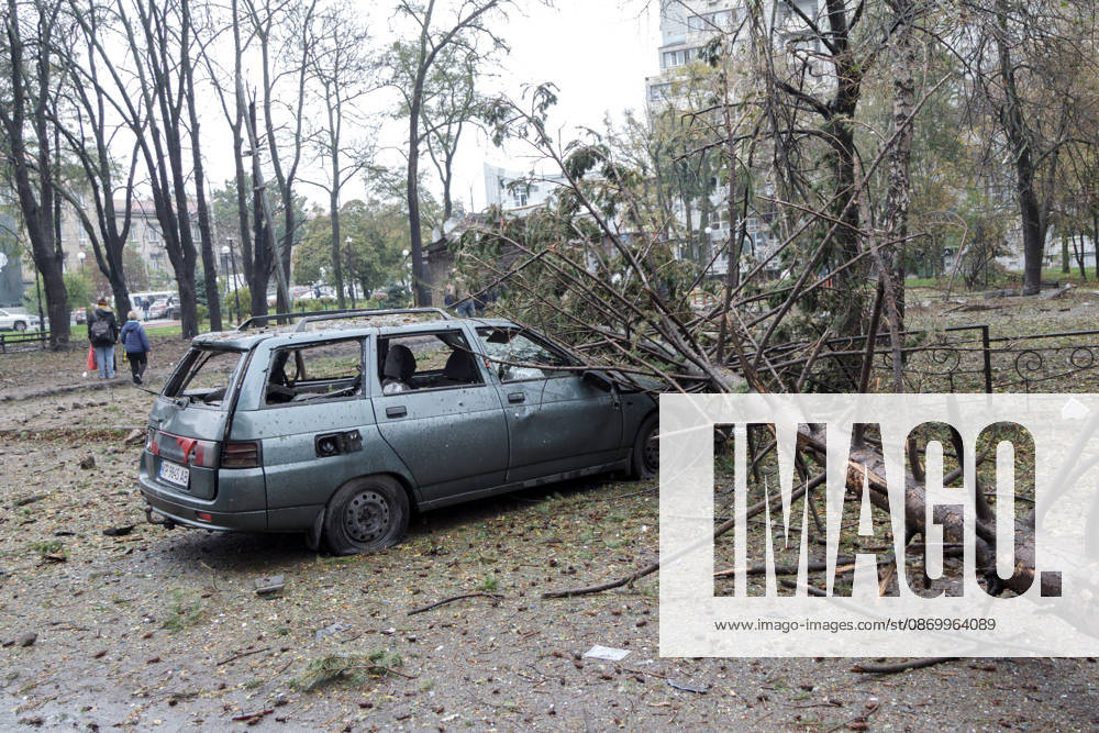 A spruce tree lies on a car in the Solomianskyi district damaged by a Russian attack, Kyiv, Ukraine, October 19, 2026. During the night and morning, Russia launched a massive strike on the capital using ballistic missiles, cruise missiles, and drones. According to Kyiv city head Vitali Klitschko, five people were injured in the Solomianskyi district as a result of the attack. Four residential buildings, a bank office, a private medical clinic, a shopping mall, offices, and vehicles were damaged. (Photo by Kyrylo Chubotin Ukrinform) Russian attack on Kyiv affects shopping mall
