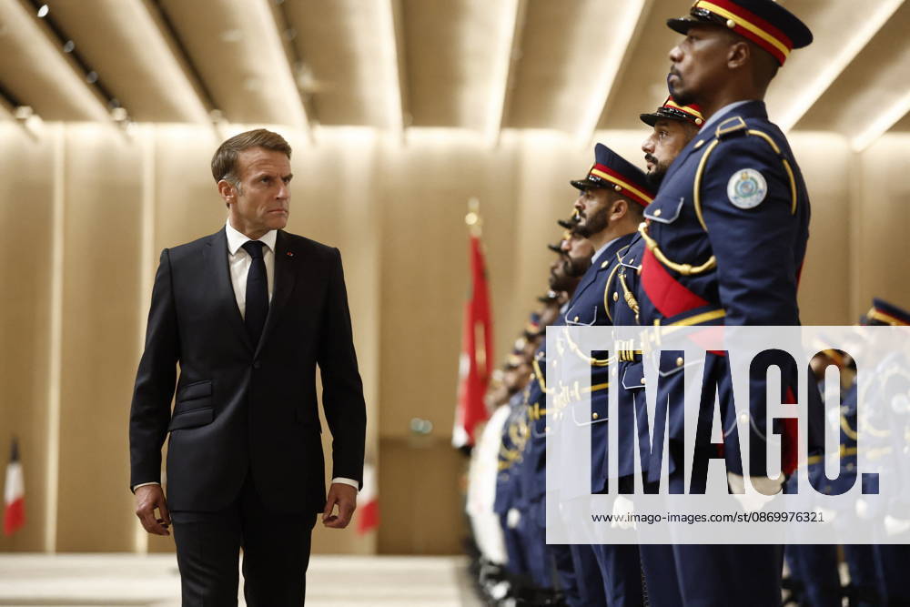 President Macron Visit To Middle East - Abu Dhabi French President Emmanuel Macron reviews troops upon his arrival at Zayed International Airport in Abu Dhabi, United Arab Emirates, October 19, 2026. Photo by Benoit Tessier Pool ABACAPRESS.COM Abu Dhabi United Arab Emirates