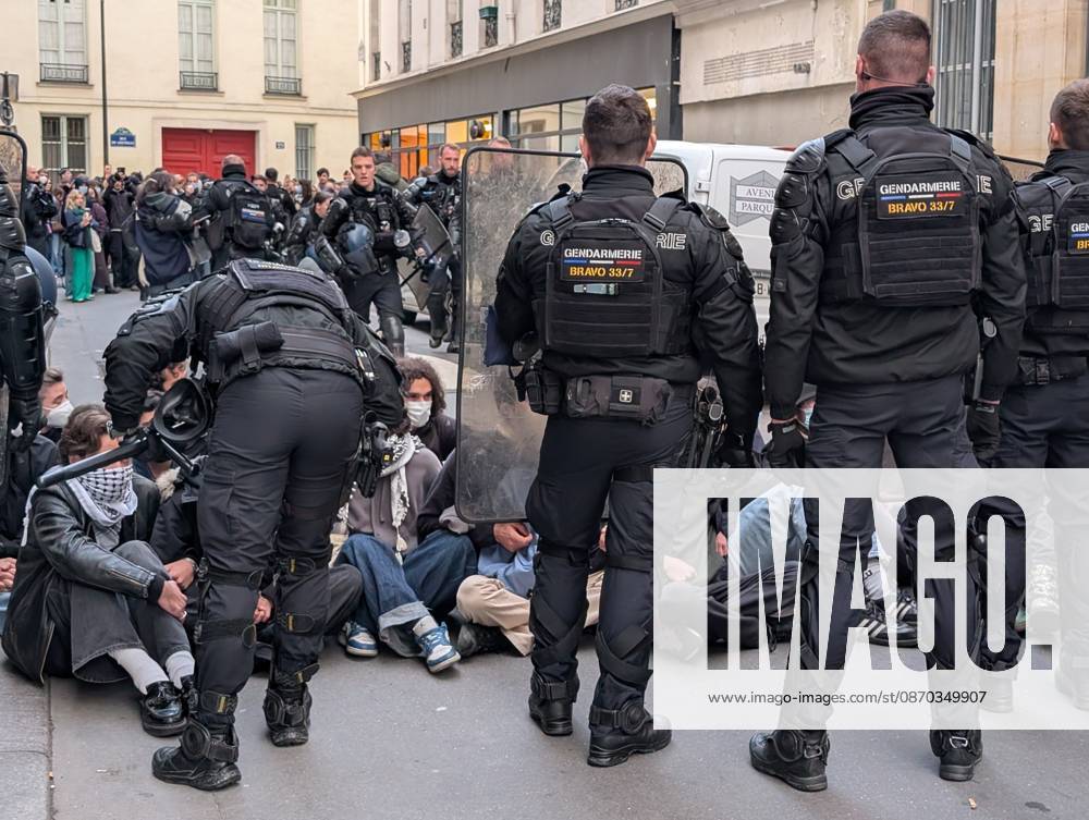 Students stage sit-in protest at Sciences Po Paris PARIS, FRANCE - OCTOBER 22: French gendarmerie officers form a security cordon as students stage a protest at Sciences Po Paris in Paris, France, on October 22, 2026. Officers holding riot shields face a crowd of protesters gathered on a street near the institution. Luc Auffret Anadolu Paris France. Editorial use only. Please get in touch for any other usage.