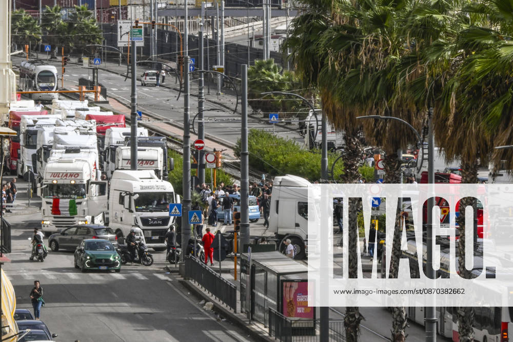 A slow-moving procession of trucks took place today in Naples. The heavy vehicles which have been stationed for days on Via Argine, blocking the exit for fuel tankers and consequently causing a shortage of gasoline and diesel at service stations moved toward the port before returning to Via Argine, leading to severe traffic disruptions, October 22, 2026. The drivers explained the reasons for their protest to passersby; many expressed that they are disappointed with the decree just enacted by the government.Rome, October 22, 2026 ANSA CIRO FUSCO Napoli ITALIA - ZUMAa110 20261022_zaf_a110_015