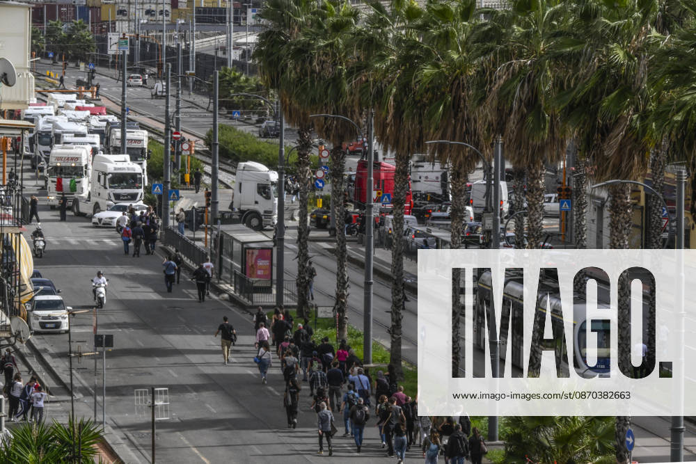 A slow-moving procession of trucks took place today in Naples. The heavy vehicles which have been stationed for days on Via Argine, blocking the exit for fuel tankers and consequently causing a shortage of gasoline and diesel at service stations moved toward the port before returning to Via Argine, leading to severe traffic disruptions, October 22, 2026. The drivers explained the reasons for their protest to passersby; many expressed that they are disappointed with the decree just enacted by the government.Rome, October 22, 2026 ANSA CIRO FUSCO Napoli ITALIA - ZUMAa110 20261022_zaf_a110_016