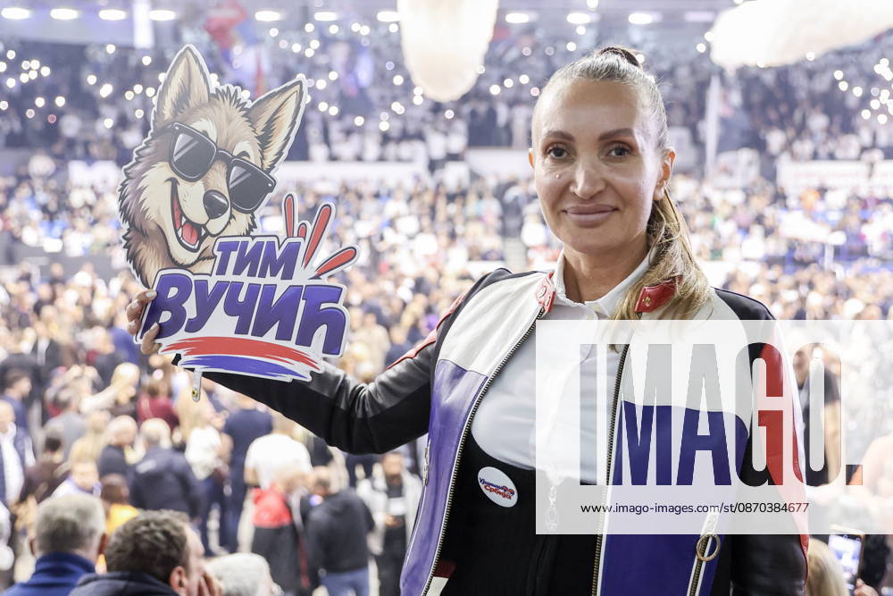SERBIA, BELGRADE - OCTOBER 22, 2026: A woman attends a rally at the Ranko Zeravica Sports Hall in support of Serbia s former President Aleksandar Vucic ahead of the 2026 Serbian parliamentary election scheduled for October 25. Vucic will head the list of the ruling Serbian Progressive Party (SNS) and run as its prime ministerial candidate Belgrade Serbia - ZUMAt113 20261022_zaa_t113_525