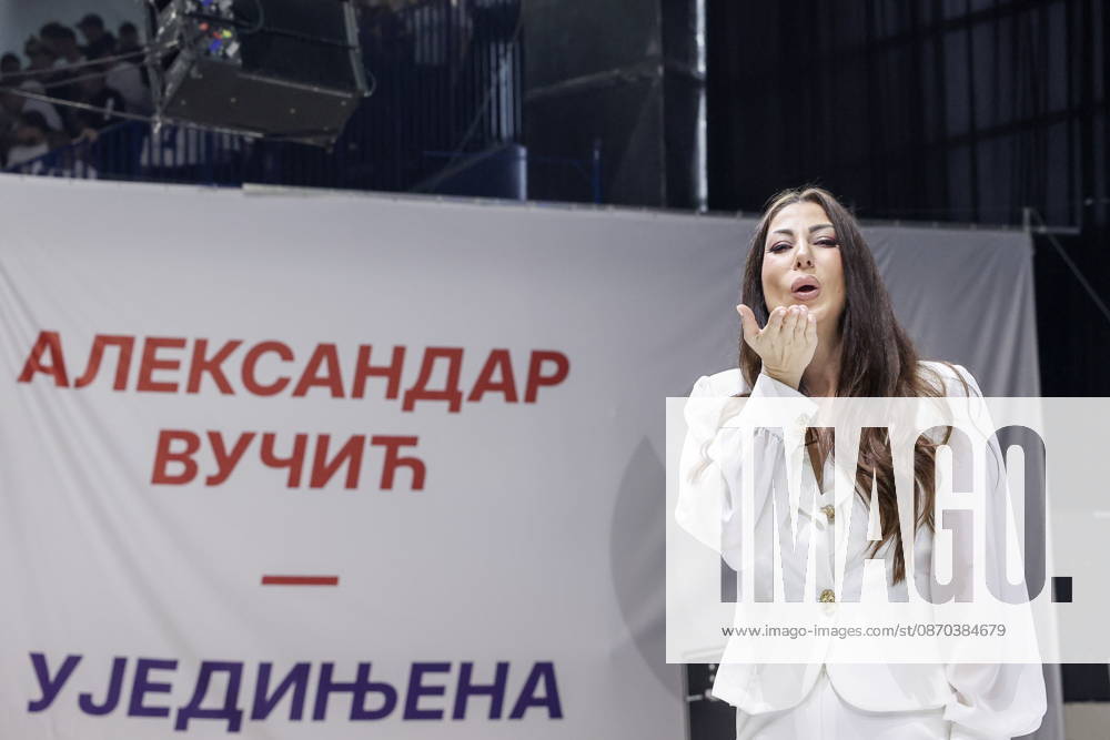 SERBIA, BELGRADE - OCTOBER 22, 2026: A woman attends a rally at the Ranko Zeravica Sports Hall in support of Serbia s former President Aleksandar Vucic ahead of the 2026 Serbian parliamentary election scheduled for October 25. Vucic will head the list of the ruling Serbian Progressive Party (SNS) and run as its prime ministerial candidate Belgrade Serbia - ZUMAt113 20261022_zaa_t113_527