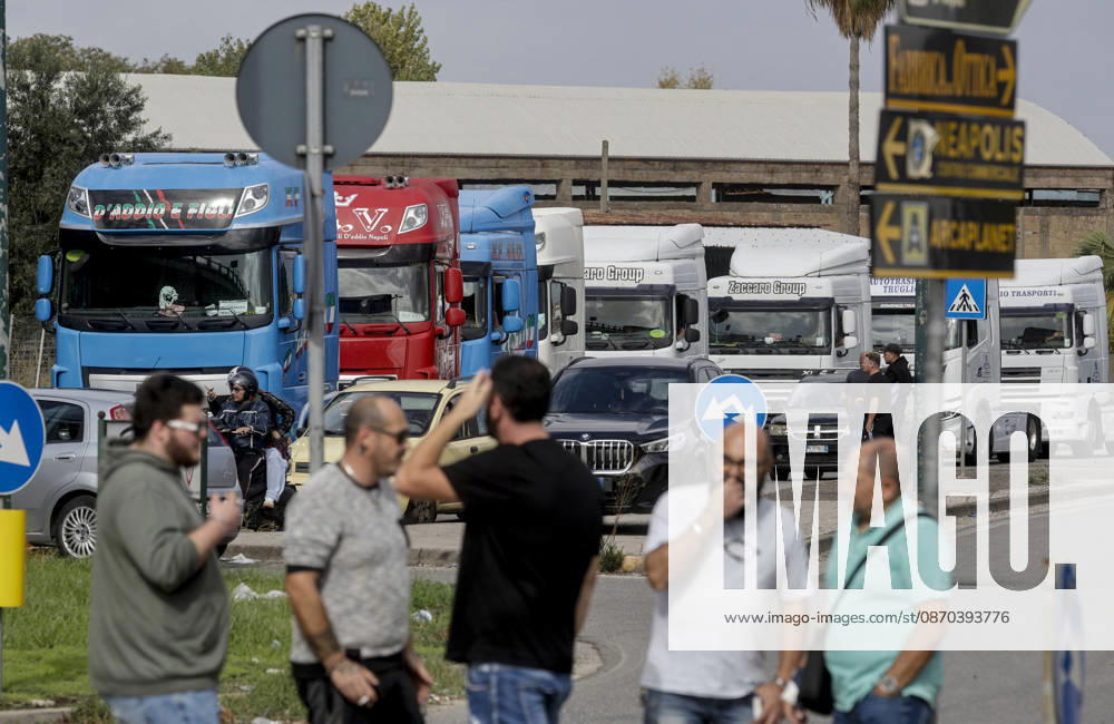 Truck Drivers Strike - Naples Truck drivers and supporters block one lane of Via Nuova Marina in Naples, Italy on October 22, 2026, during a strike against rising fuel costs that has disrupted port access at the Bausan entrance. Photo by Salvatore Laporta KONTROLAB IPA ABACAPRESS.COM Naples Campania Italy