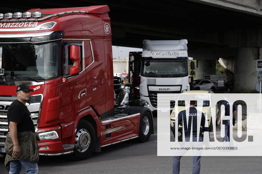 Truck Drivers Strike - Naples Truck drivers and supporters block one lane of Via Nuova Marina in Naples, Italy on October 22, 2026, during a strike against rising fuel costs that has disrupted port access at the Bausan entrance. Photo by Napolipress IPA ABACAPRESS.COM Naples Italy