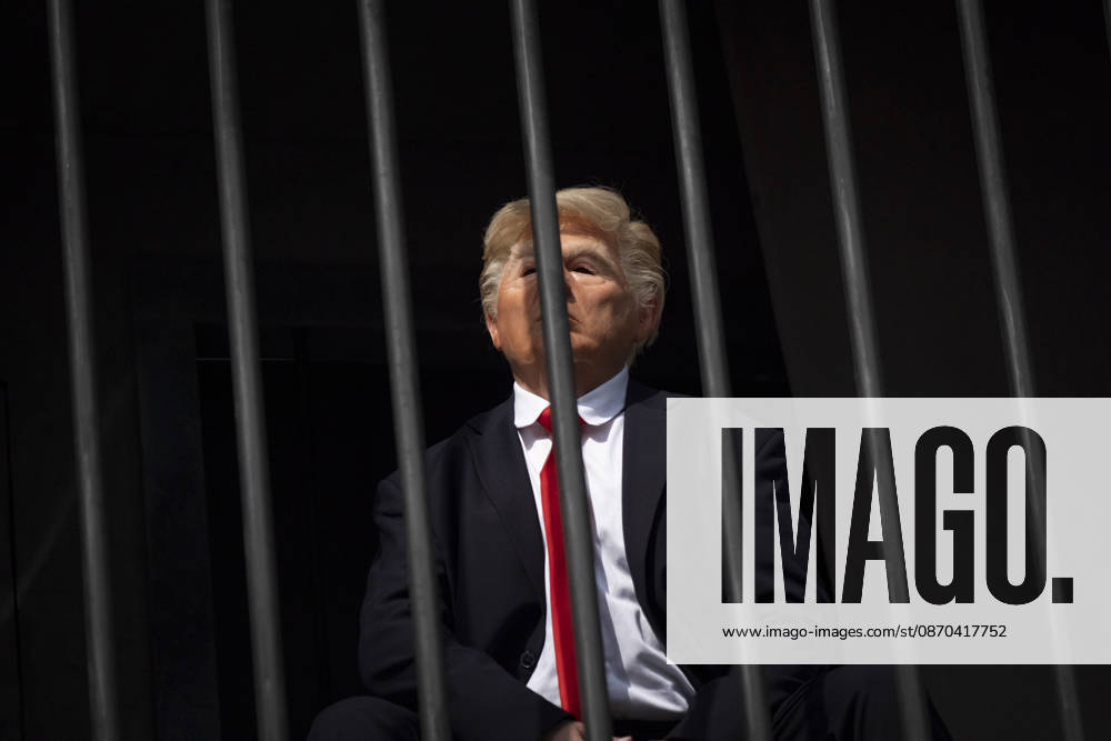 Anti-U.S. President Trump Performance On Billboard Reactions An Iranian masked man performs as U.S. President Donald Trump inside a symbolic cell mounted on a billboard in northern Tehran, Iran, on October 22, 2026, amid escalating tensions between Iran and the United States. Tehran Tehran Iran