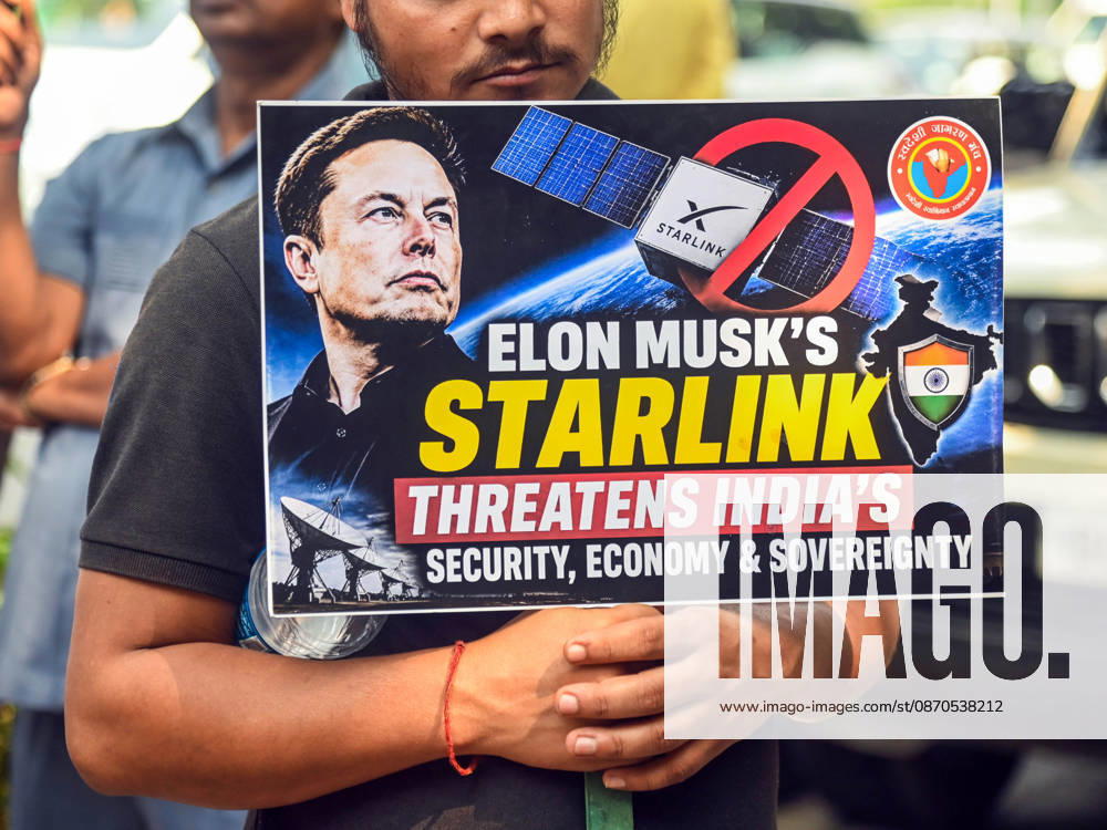Swadeshi Jagaran Manch Members And Supporters Stage A Protest Against Starlink in New Delhi New Delhi, Oct 23 (ANI): A protester holds a placard during a protest staged by Swadeshi Jagaran Manch members and supporters against Tesla CEO Elon Musk s satellite-based internet services, Starlink, in New Delhi on Friday. NEW DELHI Delhi India