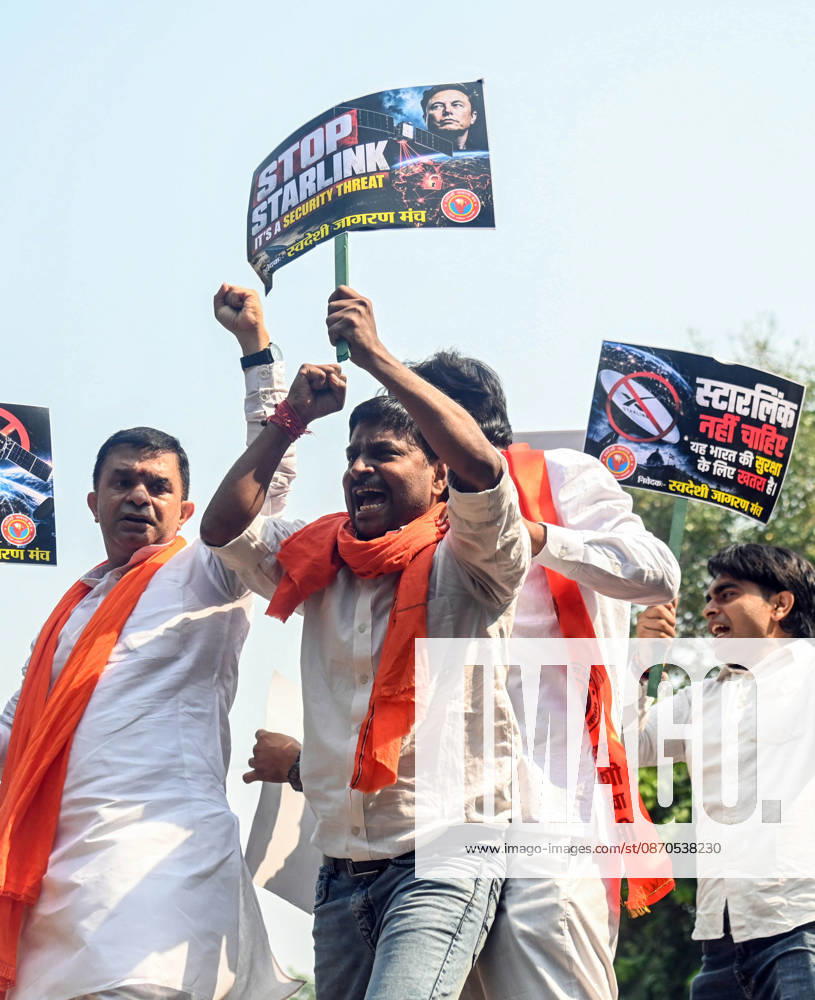 Swadeshi Jagaran Manch Members And Supporters Stage A Protest Against Starlink in New Delhi New Delhi, Oct 23 (ANI): A protester holds a placard and raises slogans during a protest staged by Swadeshi Jagaran Manch members and supporters against Tesla CEO Elon Musk s satellite-based internet service, Starlink, in New Delhi on Friday. NEW DELHI Delhi India