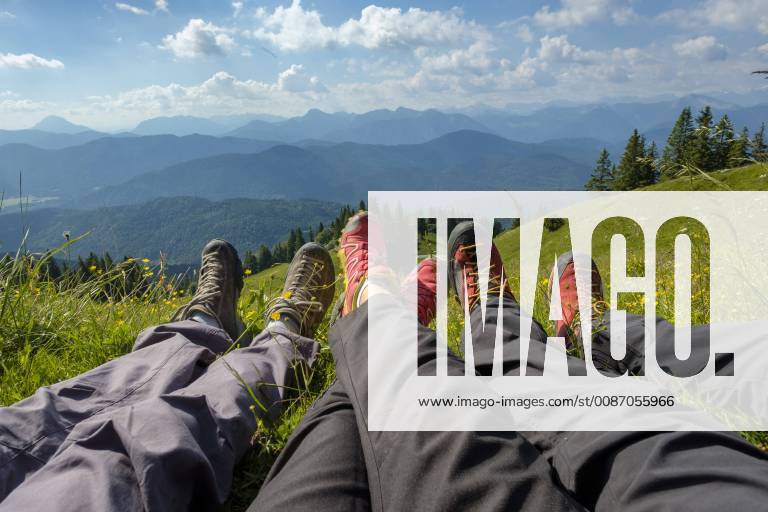 Germany, Bavaria, Brauneck near Lenggries, legs of hikers in meadow in alpine landscape model released Symbolfoto LBF02070