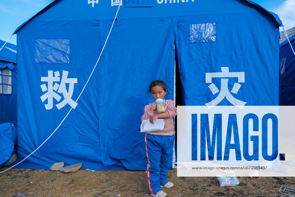 People are seen at a temporary resettlement site of an earthquake-hit village in Maru Township of Baqen County, Nagqu City, southwest China s Xizang Autonomous Region, on October 23, 2026. Sixteen people have been killed and 76 others are injured following a 7.0-magnitude earthquake that struck Baqen County of the city of Nagqu in southwest China s Xizang Autonomous Region at 10:33 p.m. on Thursday, local authorities said.
