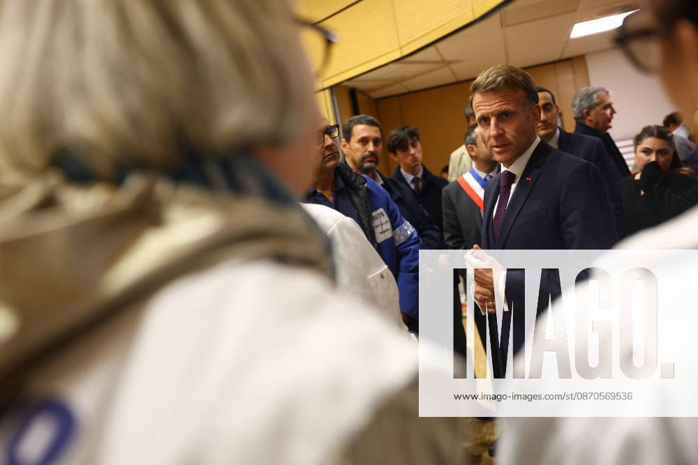 French President Macron in Trappes After Deadly Shooting - France French President Emmanuel Macron meets rescue forces at the town hall after a drive-by shooting during which a person was killed and at least four others were wounded including a 12-year-old girl, in Trappes, in the Yvelines department, near Paris, France, October 23, 2026. Photo by Hannah McKay Pool ABACAPRESS.COM Trappes France