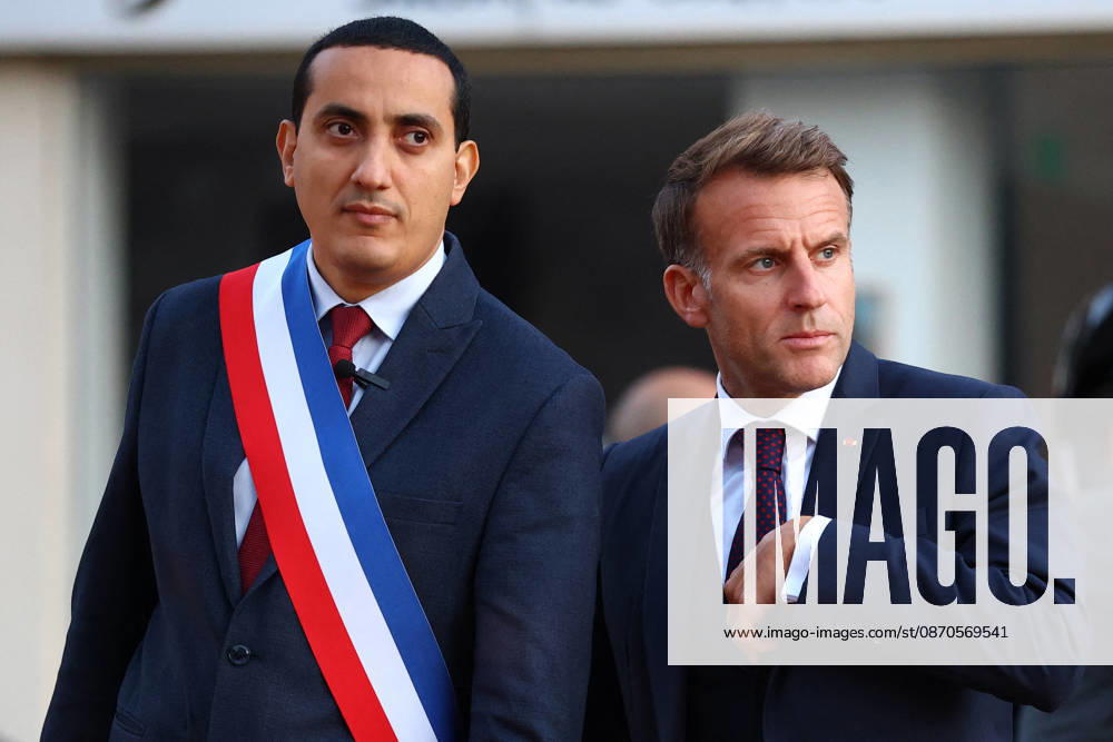 French President Macron in Trappes After Deadly Shooting - France French President Emmanuel Macron walks with Mayor of Trappes Ali Rabeh as he arrives for a meeting at the town hall after a drive-by shooting during which a person was killed and at least four others were wounded including a 12-year-old girl, in Trappes, in the Yvelines department, near Paris, France, October 23, 2026. Photo by Hannah McKay Pool ABACAPRESS.COM Trappes France