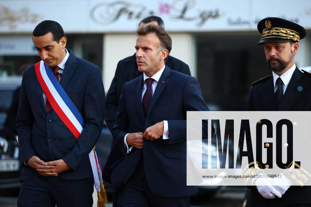 French President Macron in Trappes After Deadly Shooting - France French President Emmanuel Macron walks with Mayor of Trappes Ali Rabeh and Brice Blondel, Prefect of the Yvelines as he arrives for a meeting at the town hall after a drive-by shooting during which a person was killed and at least four others were wounded including a 12-year-old girl, in Trappes, in the Yvelines department, near Paris, France, October 23, 2026. Photo by Hannah McKay Pool ABACAPRESS.COM Trappes France
