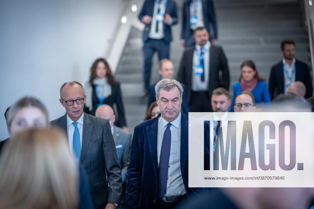 Chancellor Friedrich Merz speaks here alongside CSU Party Chairman Markus Söder on their way to Exhibition Hall C6 at the CSU Party Convention in Munich, Munich, Bavaria, Germany, Munich Exhibition Center