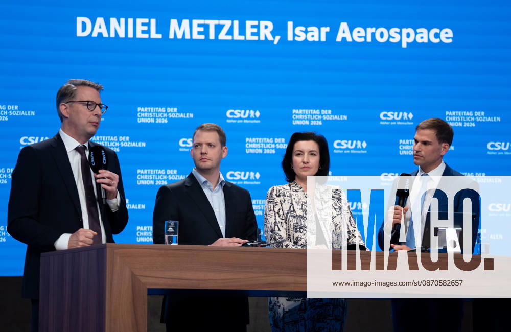 Munich, Bavaria, Germany October 24, 2026: Day 2 of the 2026 CSU (Christian Social Union) Party Convention at the Munich Trade Fair Center. Markus Blume (Member of the Bavarian State Parliament), Daniel Metzler (co-founder and CEO of the German space startup Isar Aerospace), Dorothee Bär (Member of the German Bundestag, Federal Minister for Research, Technology, and Space of the Federal Republic of Germany), and Maximilian Böltl (Member of the Bavarian State Parliament) on stage