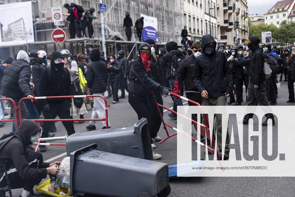 Demonstration and clashes between protesters and police in Strasbourg STRASBOURG, FRANCE - OCTOBER 24: Protesters clash with law enforcement officers during a demonstration in the city centre of Strasbourg, France on October 24, 2026. Police officers intervene to disperse groups of protesters as tear gas is deployed. Clashes, projectile throwing and property damage are reported in several streets. Barricades and burning vehicles reflect the tense situation surrounding the protest. Elyxandro Cegarra Anadolu Strasbourg France. Editorial use only. Please get in touch for any other usage.