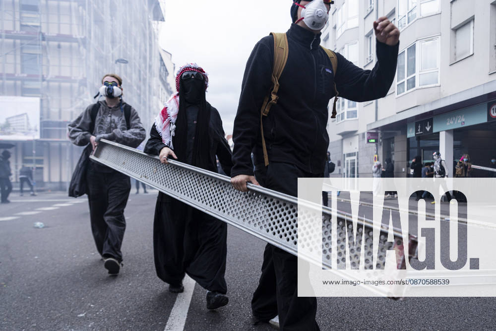 Demonstration and clashes between protesters and police in Strasbourg STRASBOURG, FRANCE - OCTOBER 24: Protesters clash with law enforcement officers during a demonstration in the city centre of Strasbourg, France on October 24, 2026. Police officers intervene to disperse groups of protesters as tear gas is deployed. Clashes, projectile throwing and property damage are reported in several streets. Barricades and burning vehicles reflect the tense situation surrounding the protest. Elyxandro Cegarra Anadolu Strasbourg France. Editorial use only. Please get in touch for any other usage.