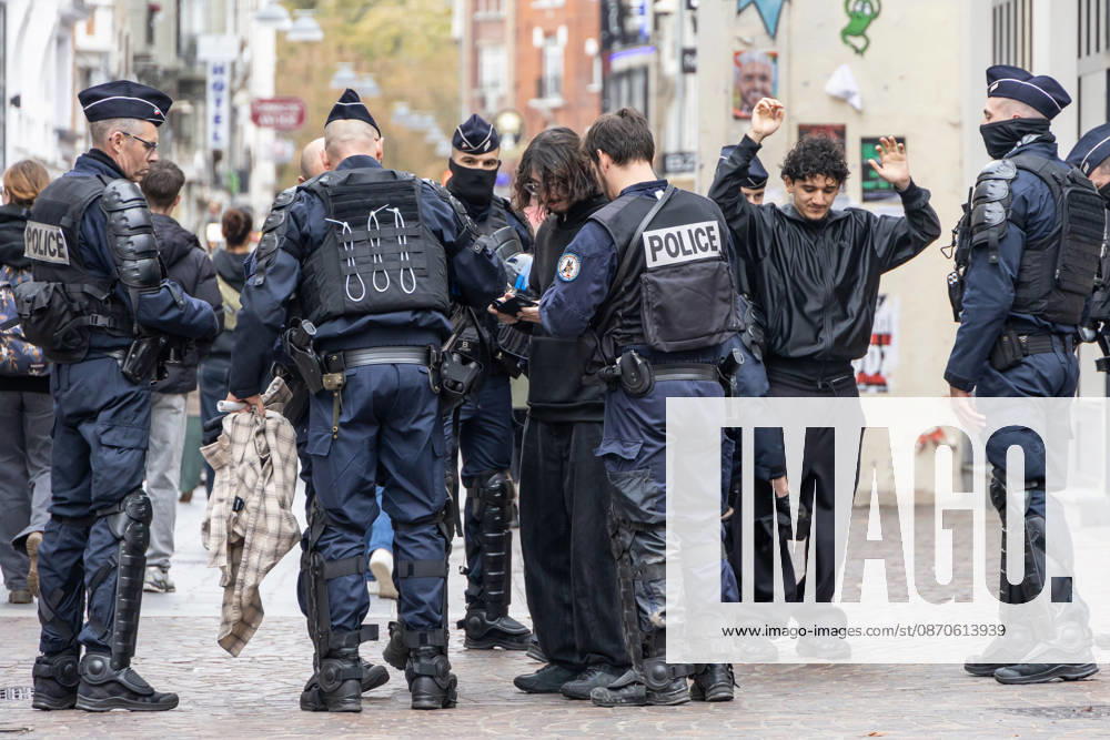 (261024) -- LILLE, Oct. 24, 2026 -- Security personnel work on the street in Lille, France, Oct. 24, 2026. Around 410,000 people took part in a new round of protests across France on Saturday, French news channel BFM TV reported, citing the Interior Ministry. (Photo by Xinhua) FRANCE-LILLE-PROTEST SebastienxCourdji
