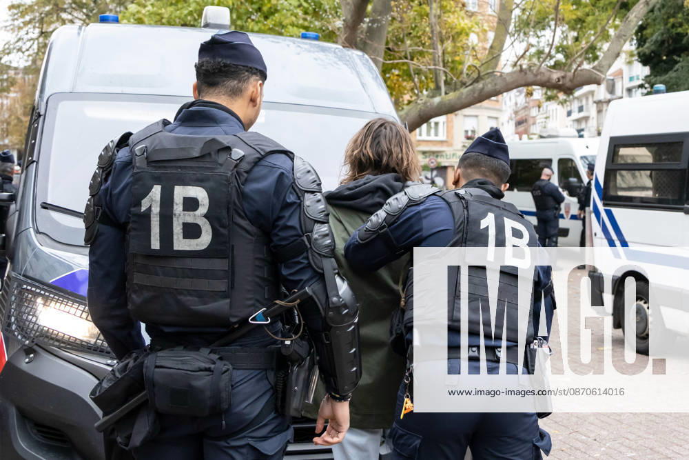 (261024) -- LILLE, Oct. 24, 2026 -- Security personnel take away a protester in Lille, France, Oct. 24, 2026. Around 410,000 people took part in a new round of protests across France on Saturday, French news channel BFM TV reported, citing the Interior Ministry. (Photo by Xinhua) FRANCE-LILLE-PROTEST SebastienxCourdji