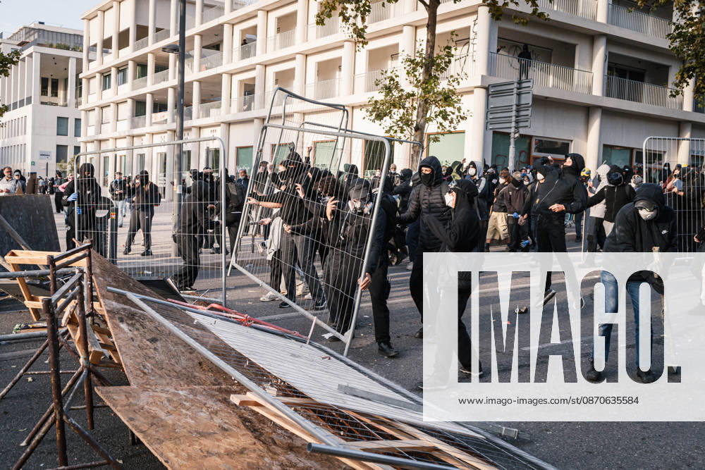 Marseille France Street Protests Protesters carry a metal fence during a protest in Marseille, France on October 24, 2026. Authorities deployed around 70,000 security personnel across France for renewed protests over the cost of living, after unrest a week earlier saw public buildings damaged, hundreds of shops looted and about 2,700 people arrested. Marseille Provence-Alpes-CÃ te France