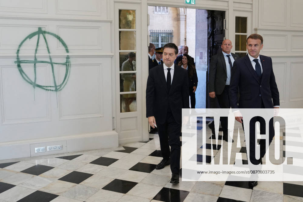 President Macron visits Marseille a Week After the Riots - France French President Emmanuel Macron and Marseille Mayor Benoit Payan enter the city hall which was recently vandalized, in Marseille, France, Monday, October 26, 2026, during a visit to notice the return of republican order after the violence and looting that punctuated the citizen mobilization of October 17, 2026. Protests by high school students over learning conditions sparked a movement that has since spread nationwide, fuelled by broader anger over the rising cost of living. Photo by Aurelien Morissard Pool ABACAPRESS.COM Marseille France