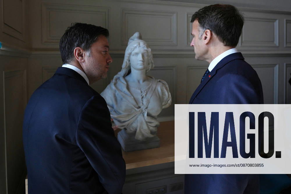 President Macron visits Marseille a Week After the Riots - France French President Emmanuel Macron and Marseille Mayor Benoit Payan inspect the bust of Marianne which was recently vandalized, at the city hall in Marseille, France, Monday, October 26, 2026, during a visit to notice the return of republican order after the violence and looting that punctuated the citizen mobilization of October 17, 2026. Protests by high school students over learning conditions sparked a movement that has since spread nationwide, fuelled by broader anger over the rising cost of living. Photo by Aurelien Morissard Pool ABACAPRESS.COM Marseille France