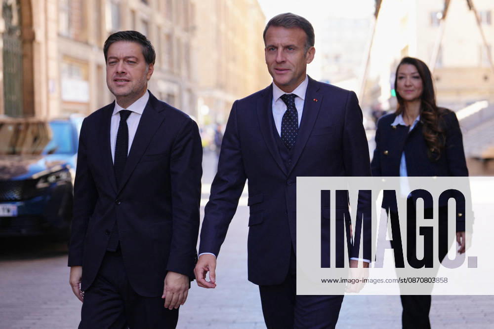 President Macron visits Marseille a Week After the Riots - France French President Emmanuel Macron and Marseille Mayor Benoit Payan walk next to each other in Marseille, France, Monday, October 26, 2026, during a visit to notice the return of republican order after the violence and looting that punctuated the citizen mobilization of October 17, 2026. Protests by high school students over learning conditions sparked a movement that has since spread nationwide, fuelled by broader anger over the rising cost of living. Photo by Aurelien Morissard Pool ABACAPRESS.COM Marseille France
